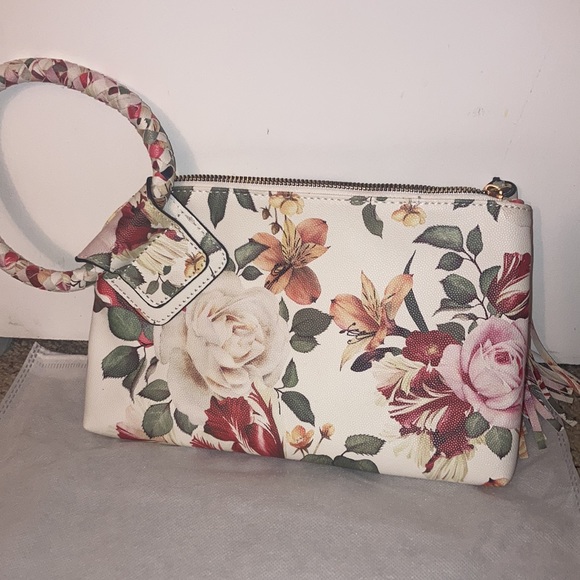 collection bag Handbags - Floral wristlet with tassel